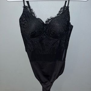 Black lace bodysuit. Never worn.